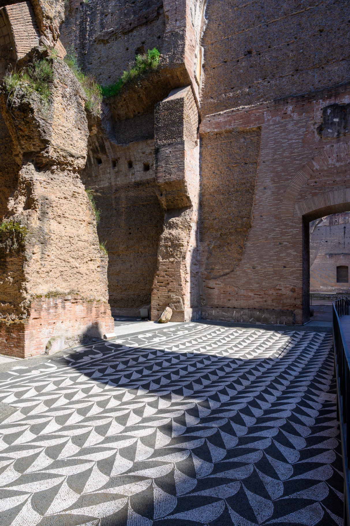 Decorative geometric mosaic floor inside an archaeological space