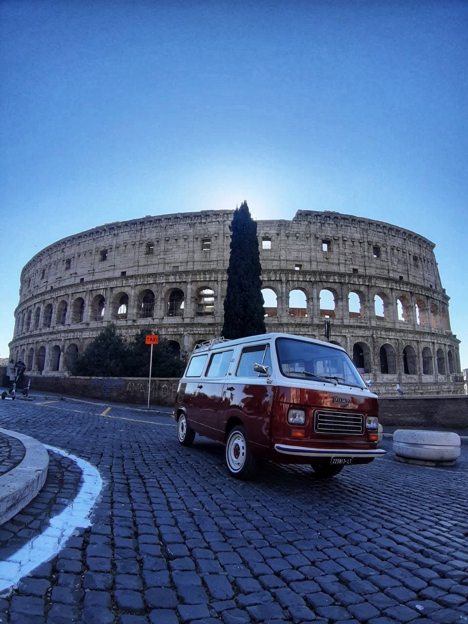 Nando parked in front of the Colosseum